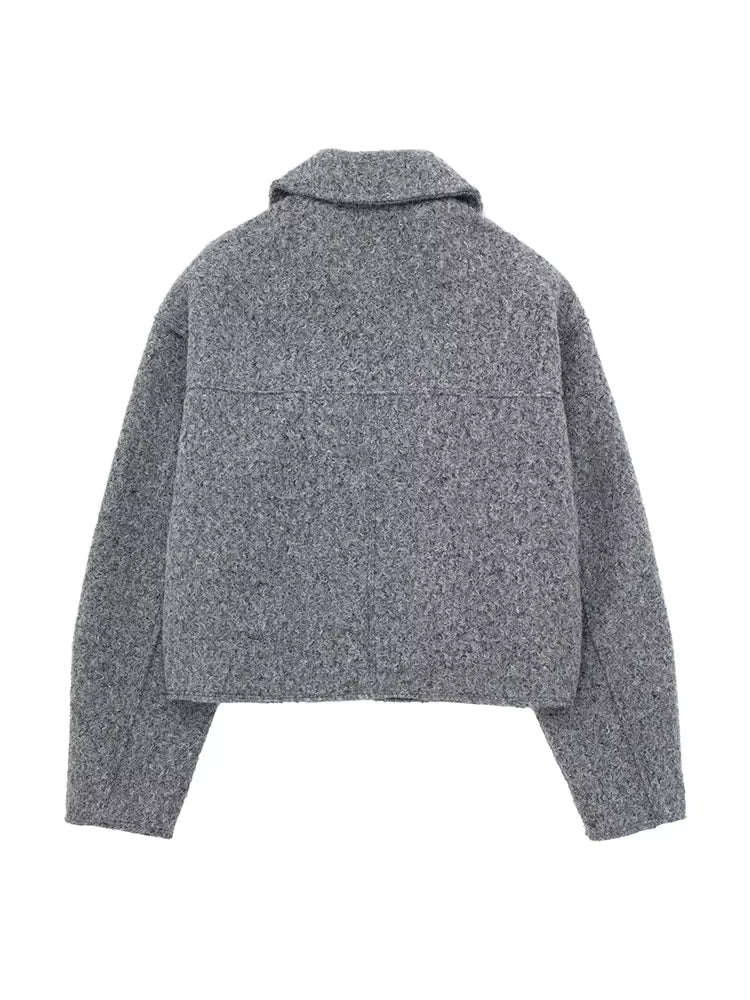 Luxury gray jacket, chic lapel collar, pockets.