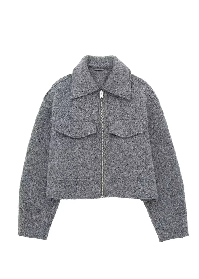 Luxury gray women’s jacket with pockets, lapel collar, chic elegance.