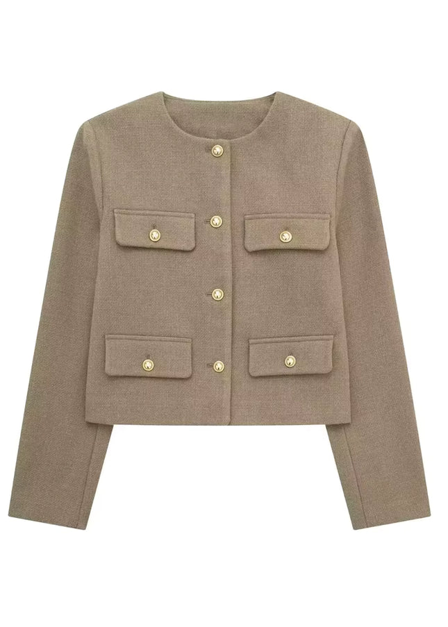Luxurious women’s jacket coat with golden buttons, elegant and timeless.