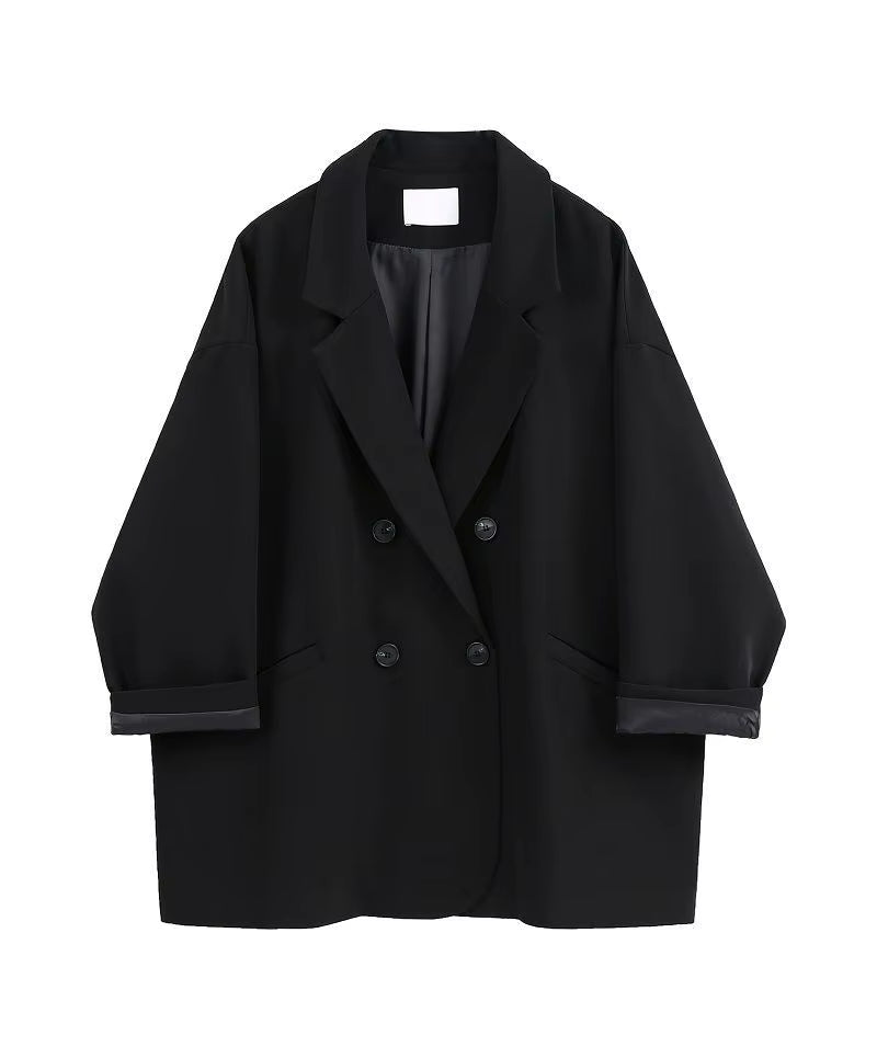 Chic oversized black blazer, elegant streetwear.